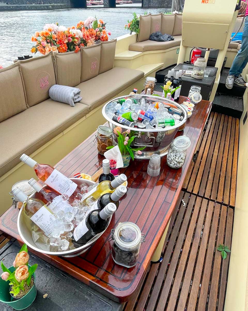 A table with wine and snack on an Amsterdam canal cruise