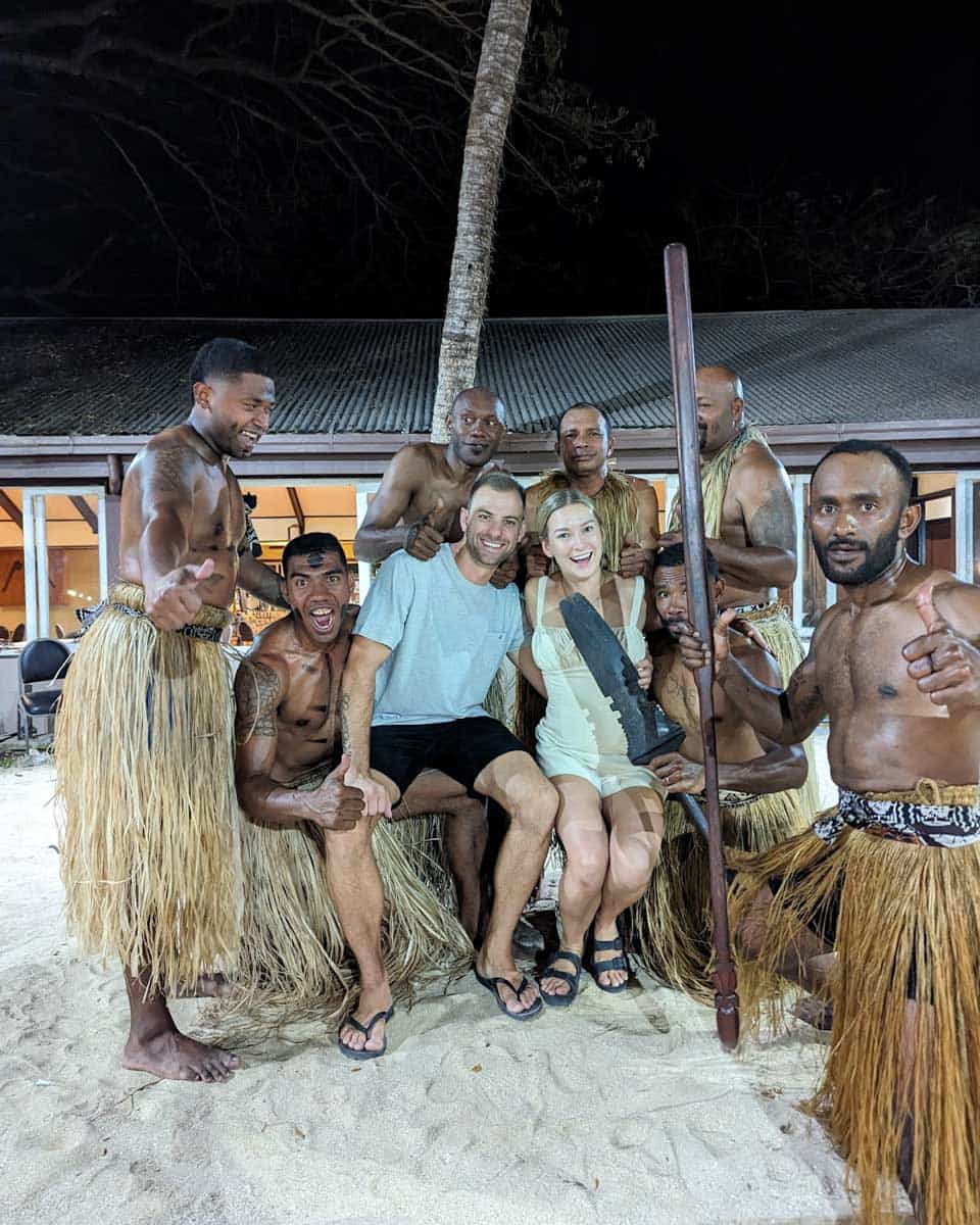 Bailey and Dan pose with the cultural dancers after a performance in Fiji