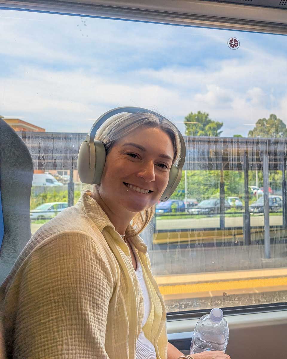 Bailey-inside-the-train-smiling-in-Bergamo