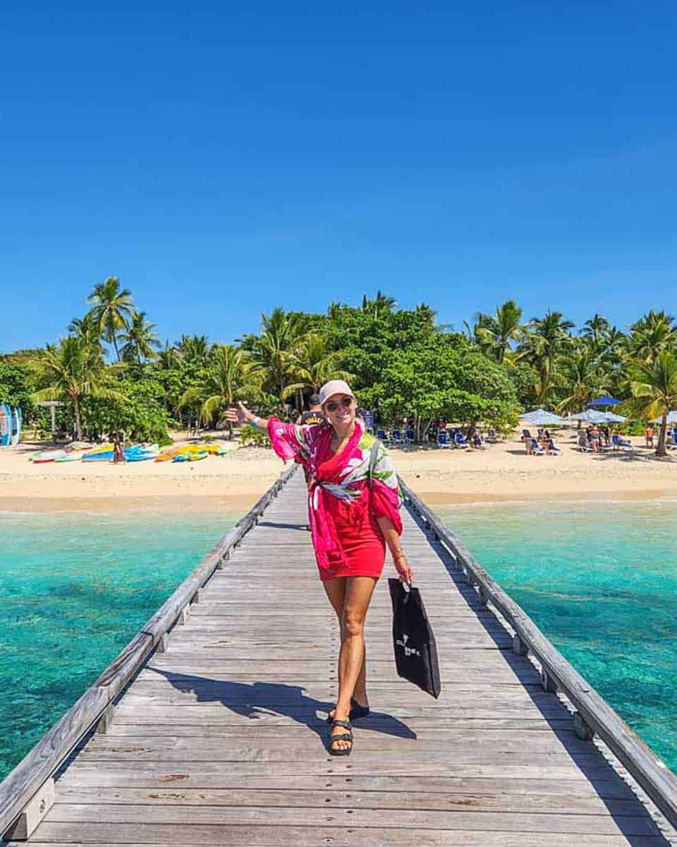 Bailey-walks-along-the-jetty-to-Malamala-Beach-Club-from-the-boat