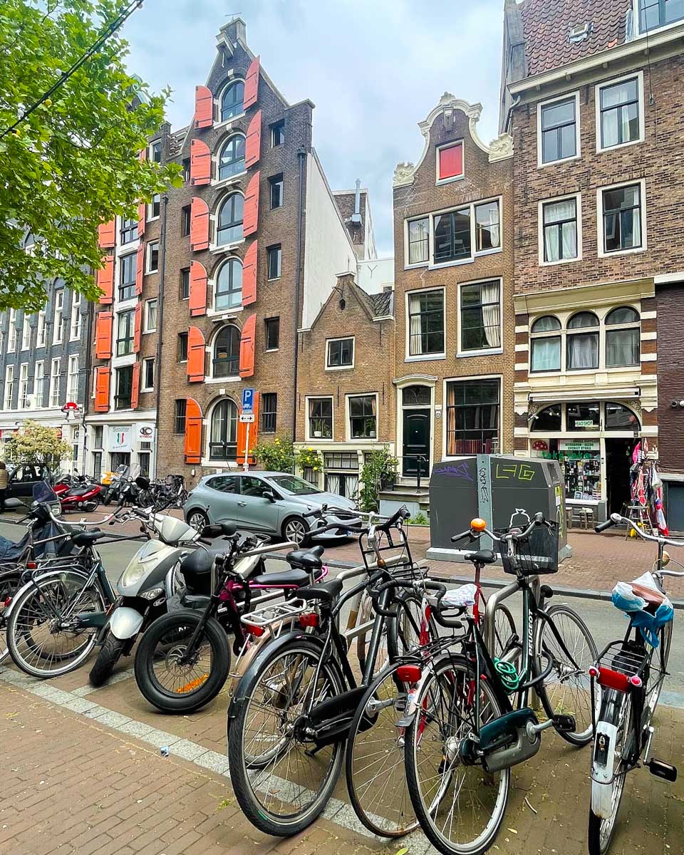 Bikes parked on a street in Amsterdam