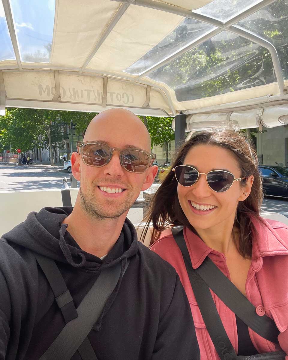 Brittni and Jesse take a selfie on a tuk tuk tour in Madrid