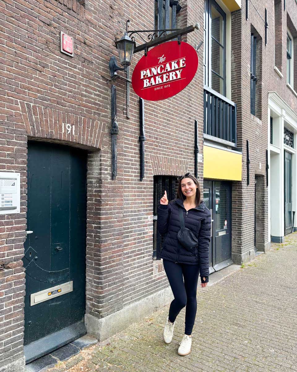 Brittni in front of the Pancake Bakery in Amsterdam