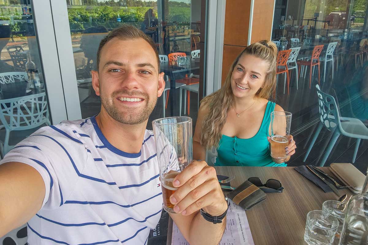 Daniel-and-Bailey-take-a-selfie-drinking-a-beer-in-Maine USA