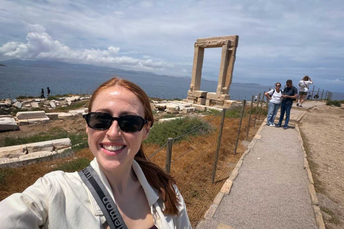 Hannah in front of Portara in Naxos Greece