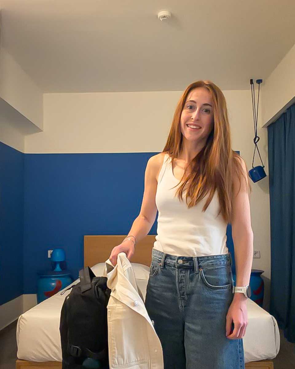 Hannah in hostel room in YellowSquare Athens in Athens Greece