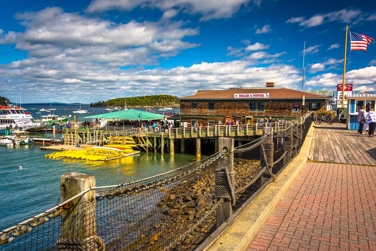 People walk through downtown Bar Harbor Maine