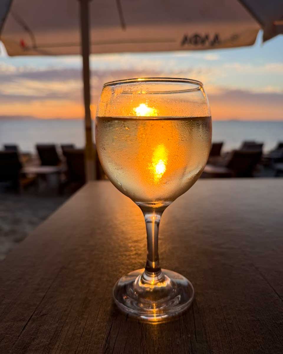 Sunset at Paradise Beach Cafe in Naxos Greece on Hannah trip