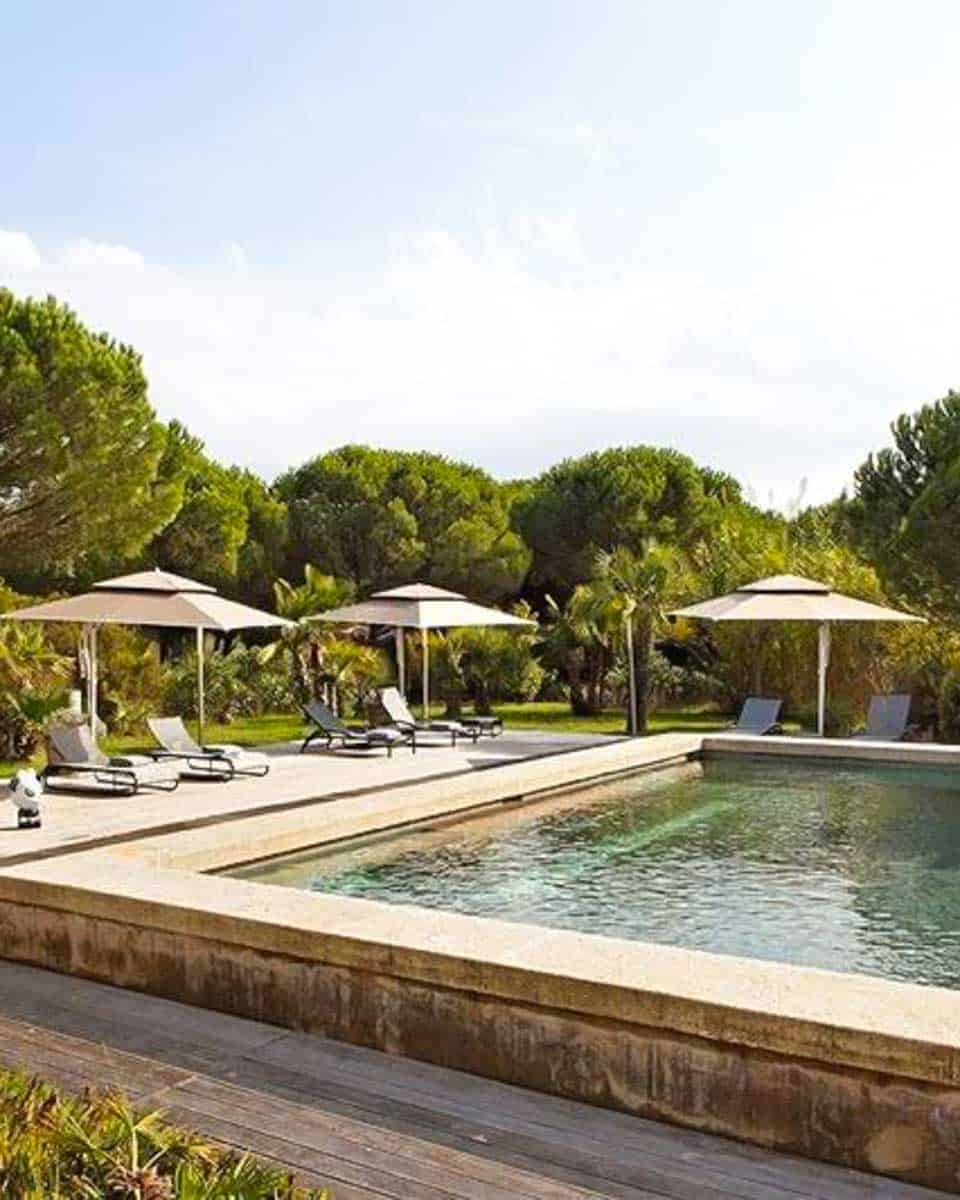 The outdoor pool area at Campagne les Jumeaux St Tropez