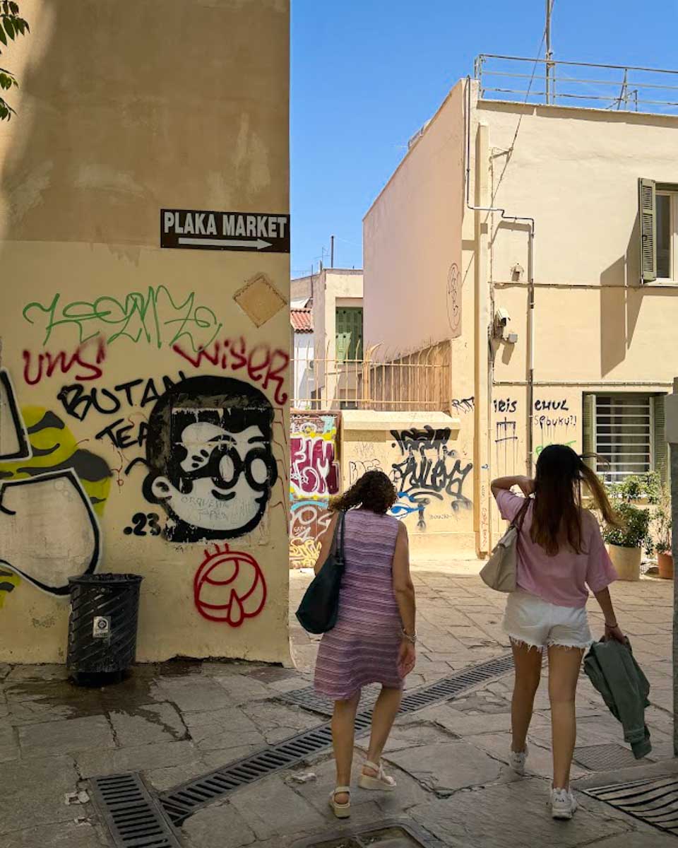 Two women on the way to Plaka market in Athens Greece on Hannah trip