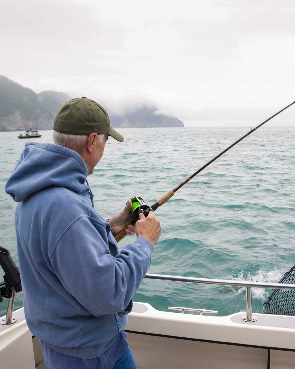 A man fishing in Ketchikan Alaska
