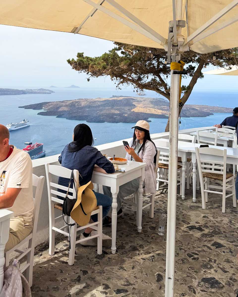 A restaurant with an ocean view in Santorini