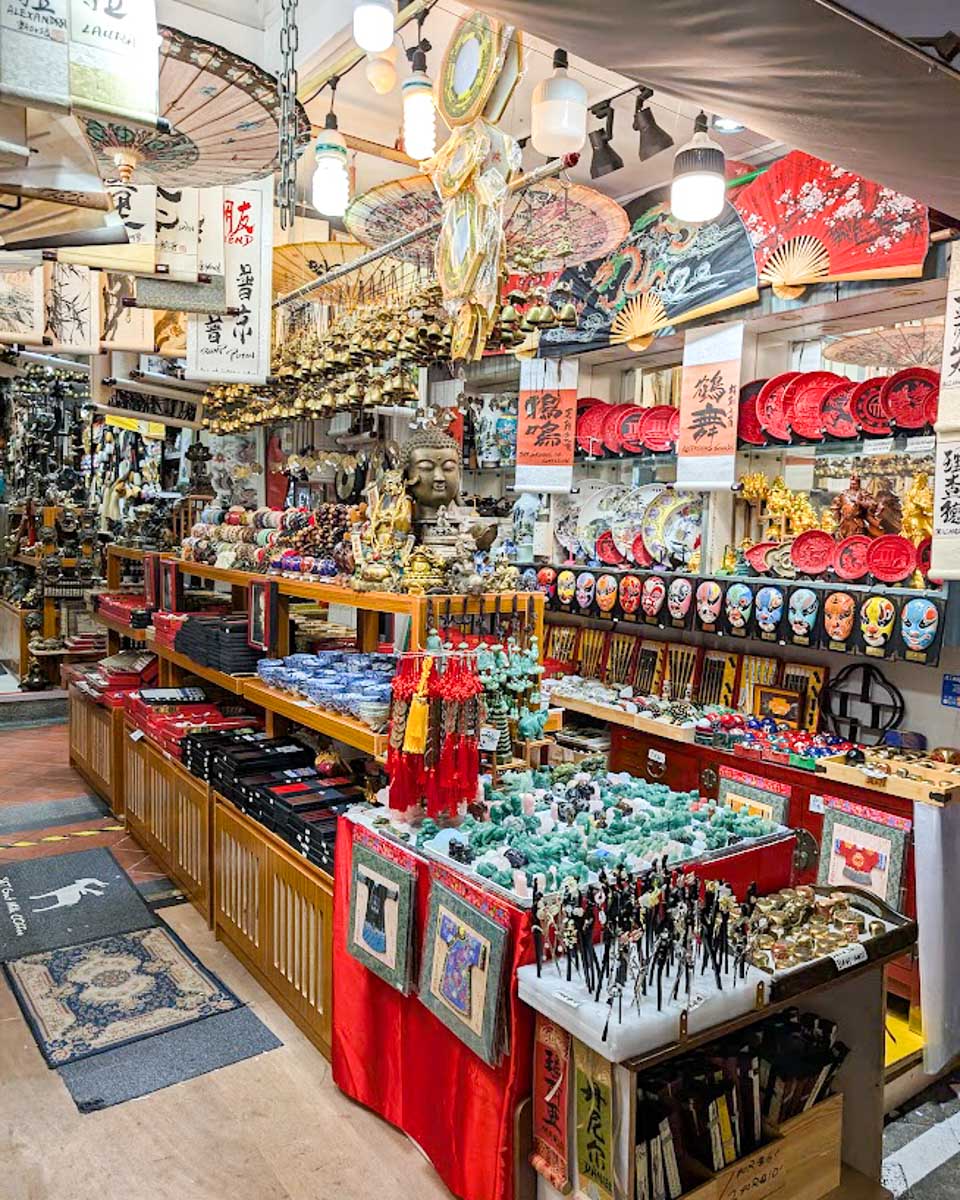 A souvenir shop filled with colorful gifts and decorations in Chinatown, Singapore