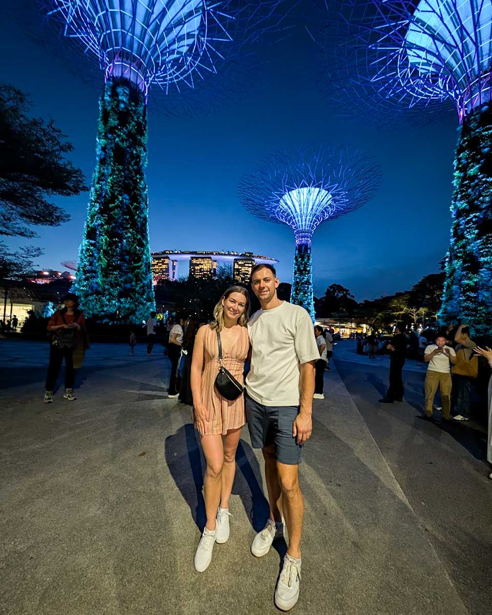 Bailey and Daniel walking at Gardens by the Bay at night in Singapore