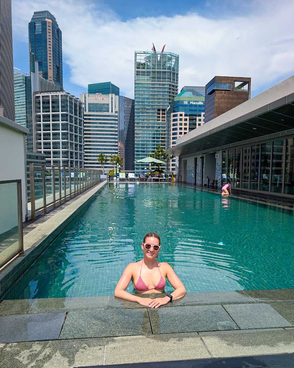 Bailey relaxing in the rooftop pool at Capri by Fraser China Square in Singapore