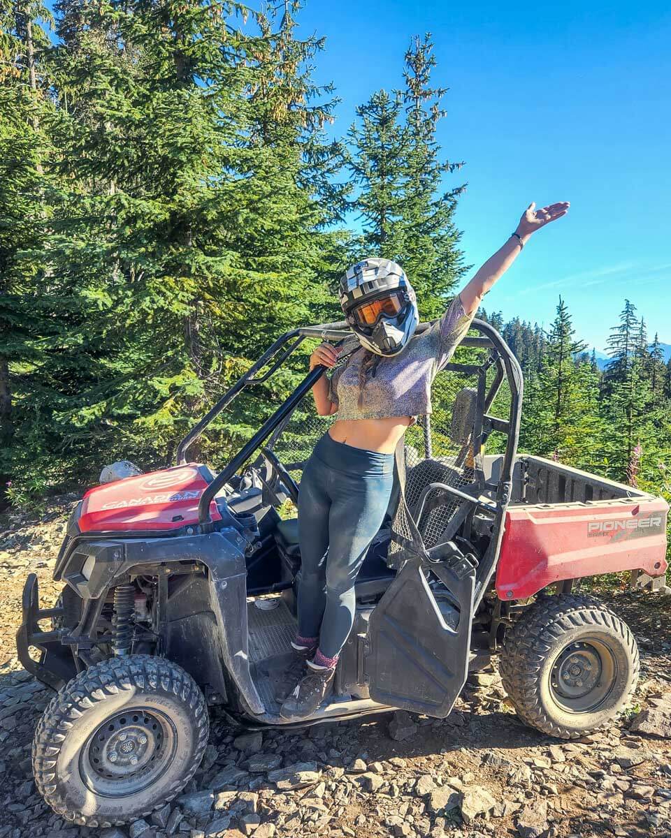 Bailey-poses-for-a-photo-in-an-ATV-vehicle-in-Ketchikan-Alaska