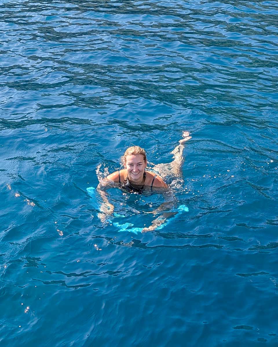 Bailey swimming at the beach on Sentosa Island