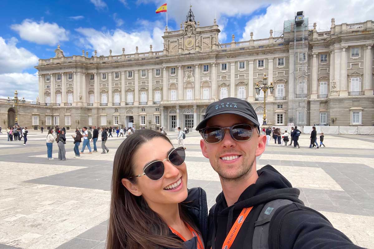 Brittni and Jesse take a selfie in front of the Royal Palace in Madrid
