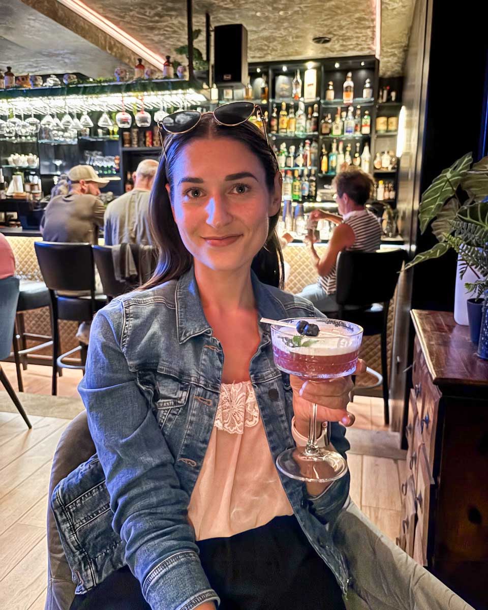 Brittni drinks a cocktail at The Bar in Dubrovnik