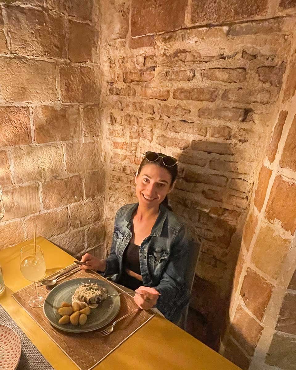 Brittni eats her dinner at Bodega de los Secretos in Madrid