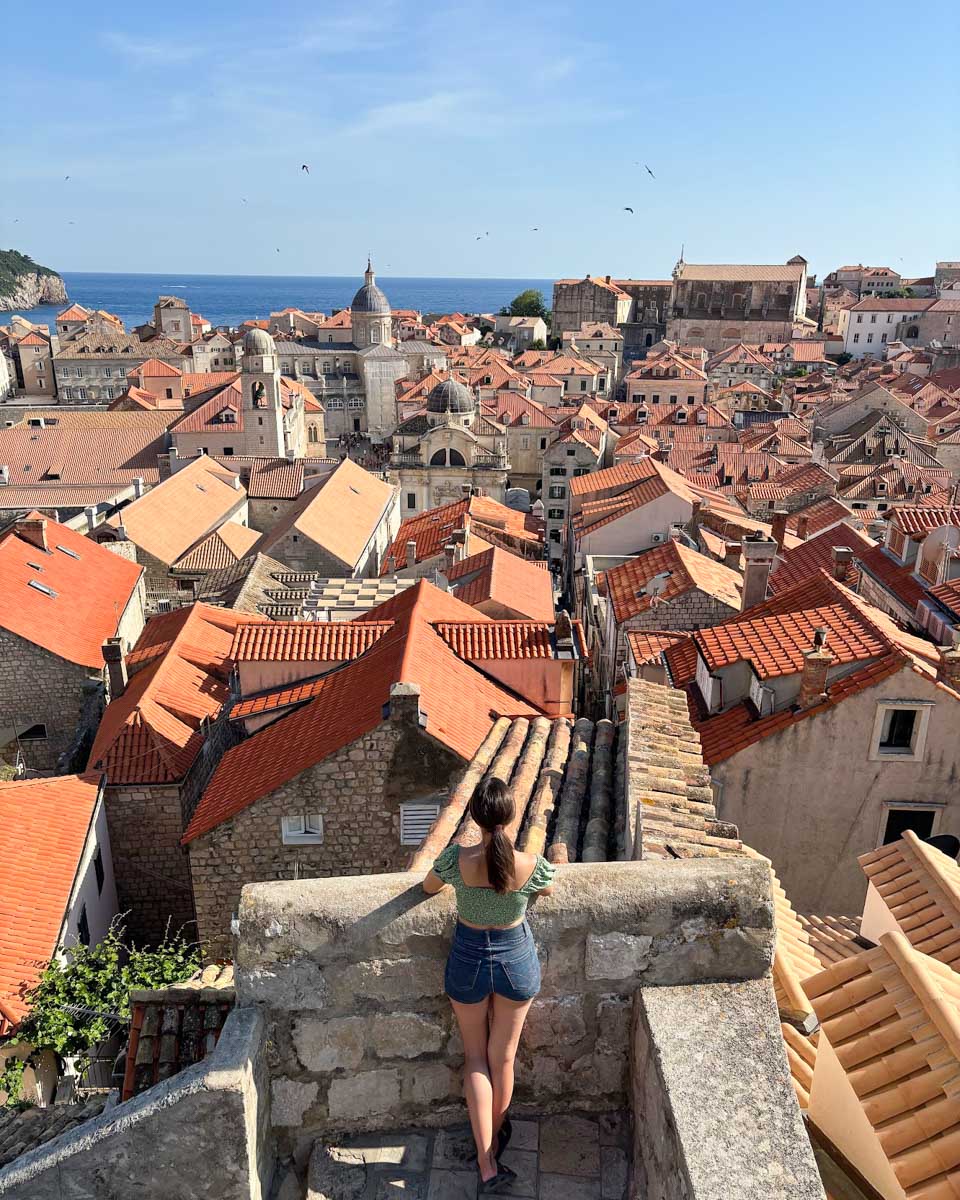 Brittni looks out over Old Town Dubrovnik while walking the city walls