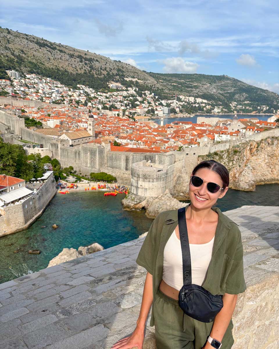 Brittni poses for a photo at Fort Lovrjenac with Old Town Dubrovnik in the background
