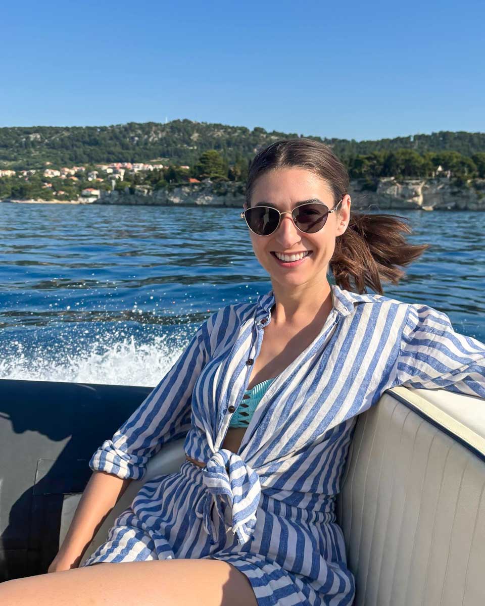 Brittni smiles on a boat on a tour from Dubrovnik