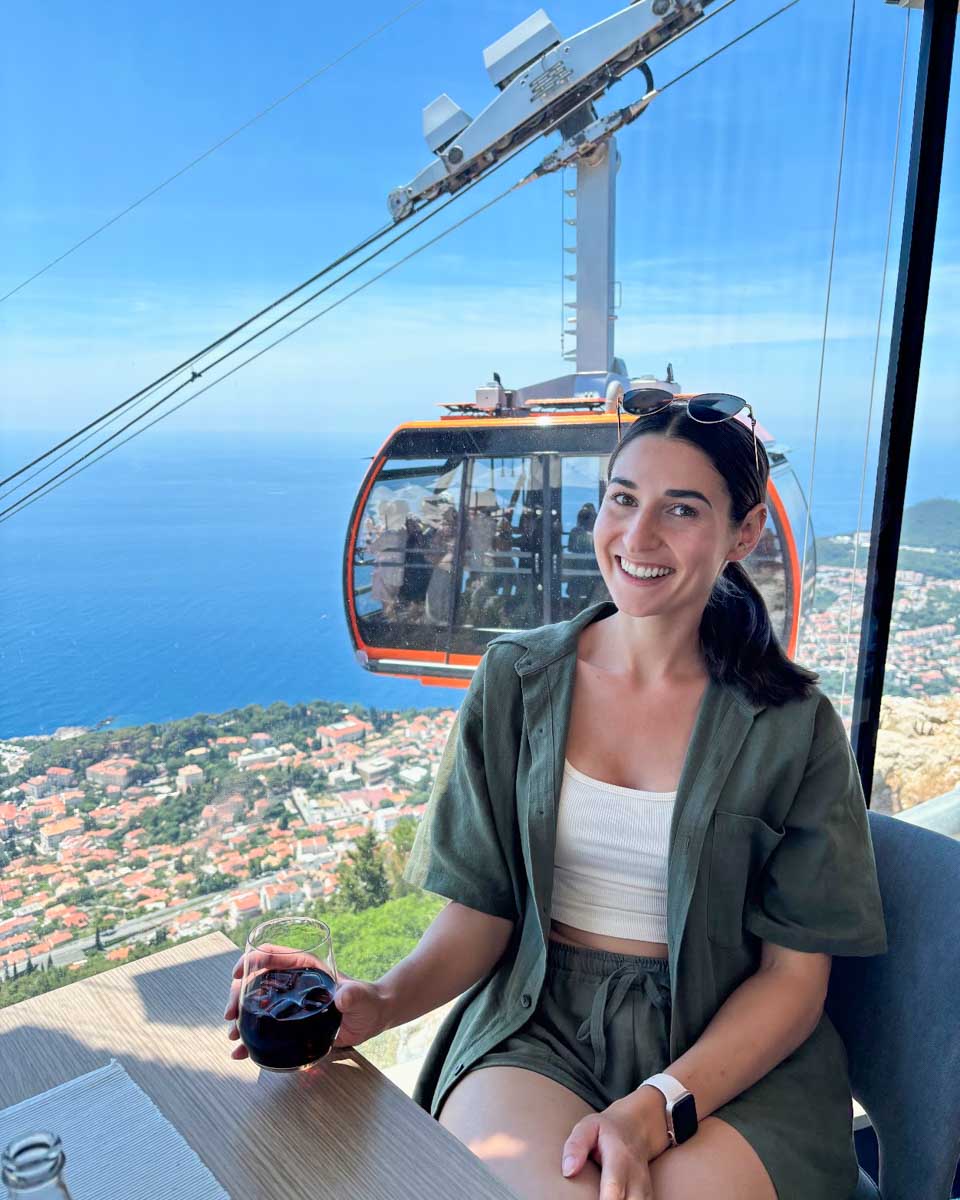 Brittni smiles overlooking Old Town from the Panorama Restaurant in Dubrovnik