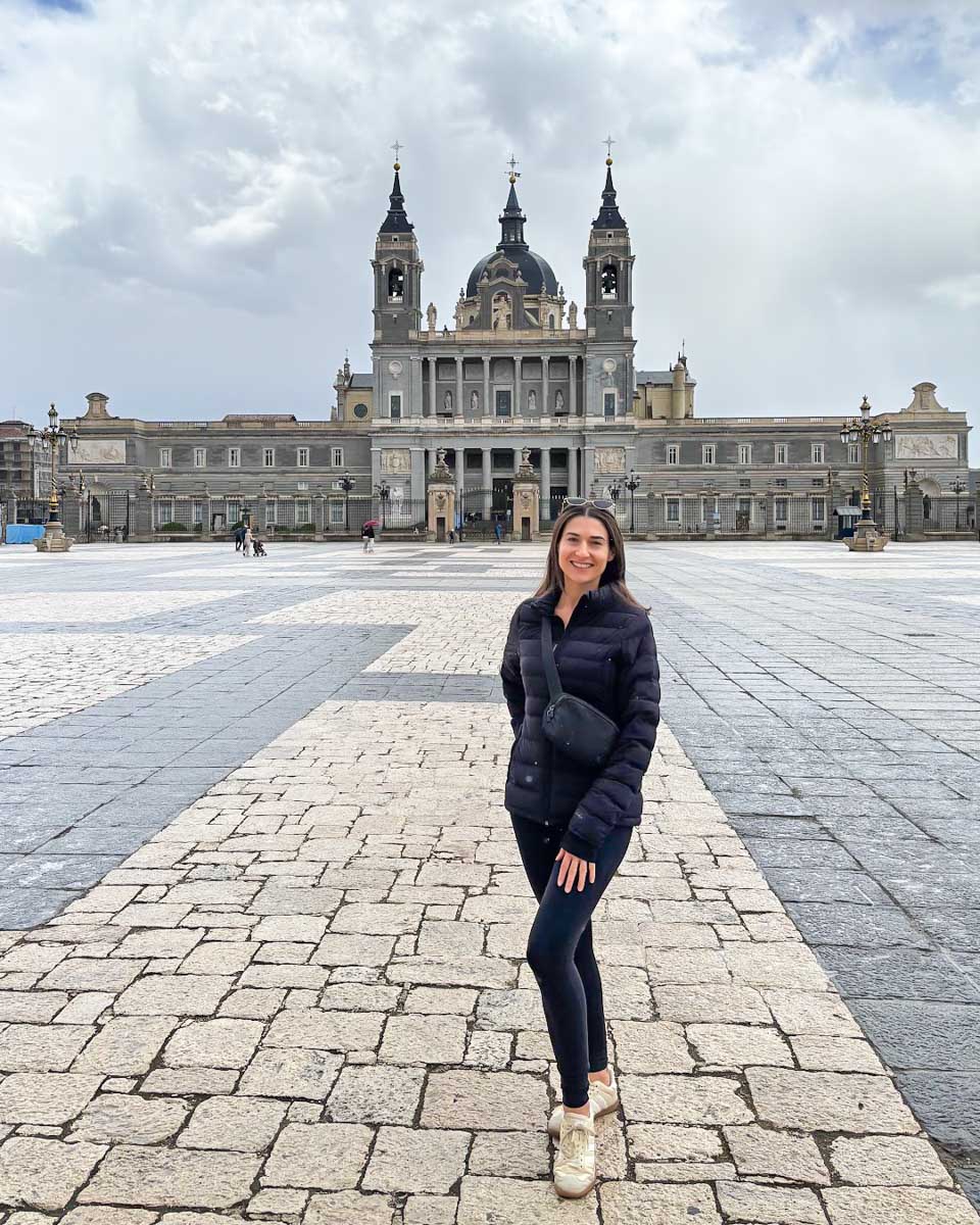 Brittni stands in front of the Almudena Cathedral in Madrid