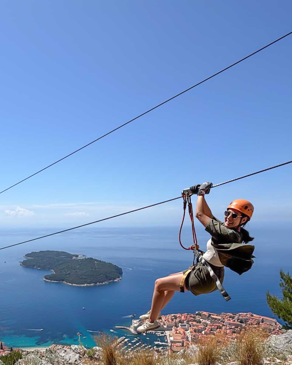 Brittni ziplines with views of Dubrovnik Old Town
