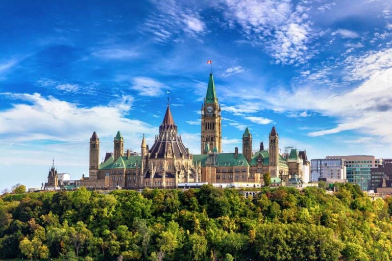 Canadian Parliament in Ottawa and river in a sunny day