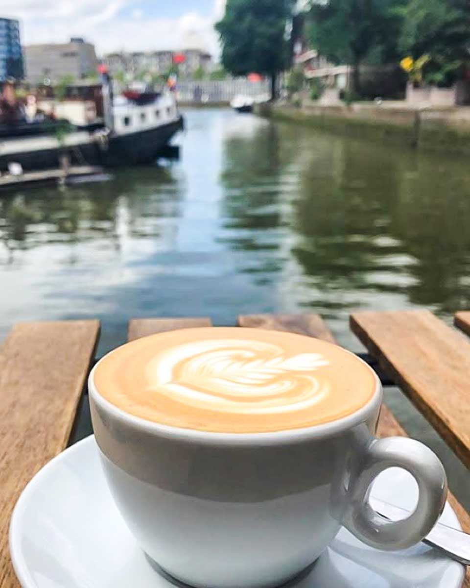 Coffee with a river view at Harvest Cafe & Bakery in Rotterdam