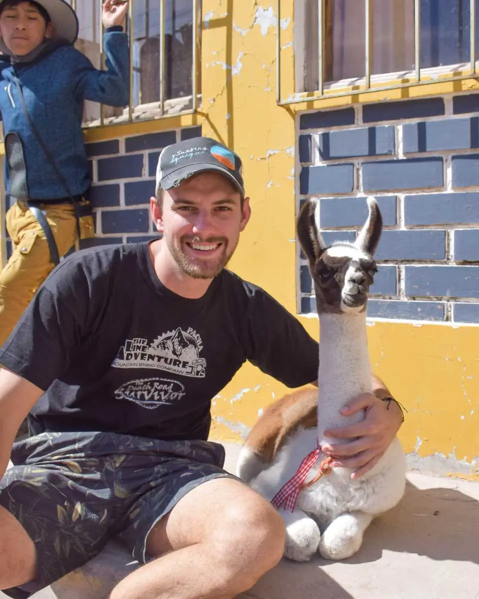 Daniel with an alpaca in Arequipa, Peru