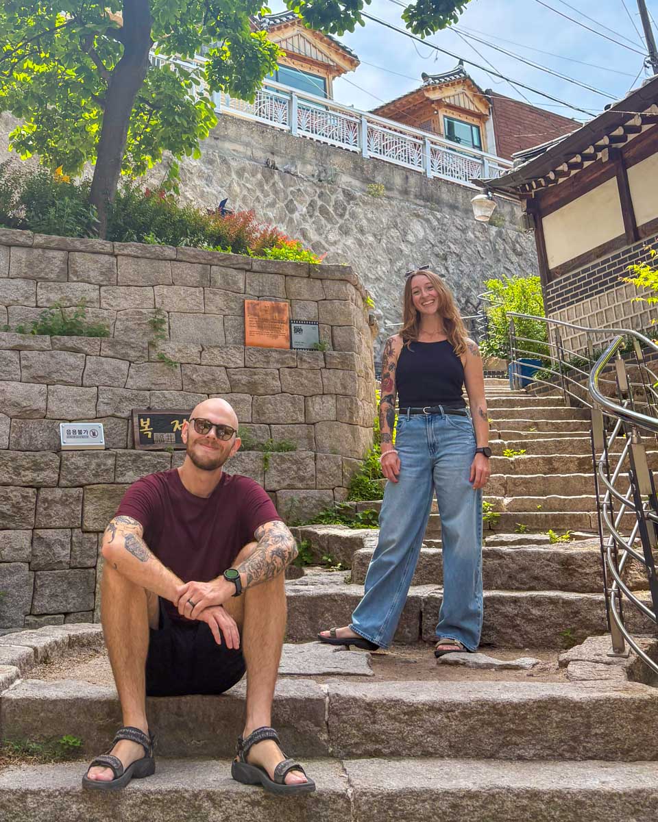 Evan and Meghan pose in Bukchon Hanok Village in Seoul, South Korea