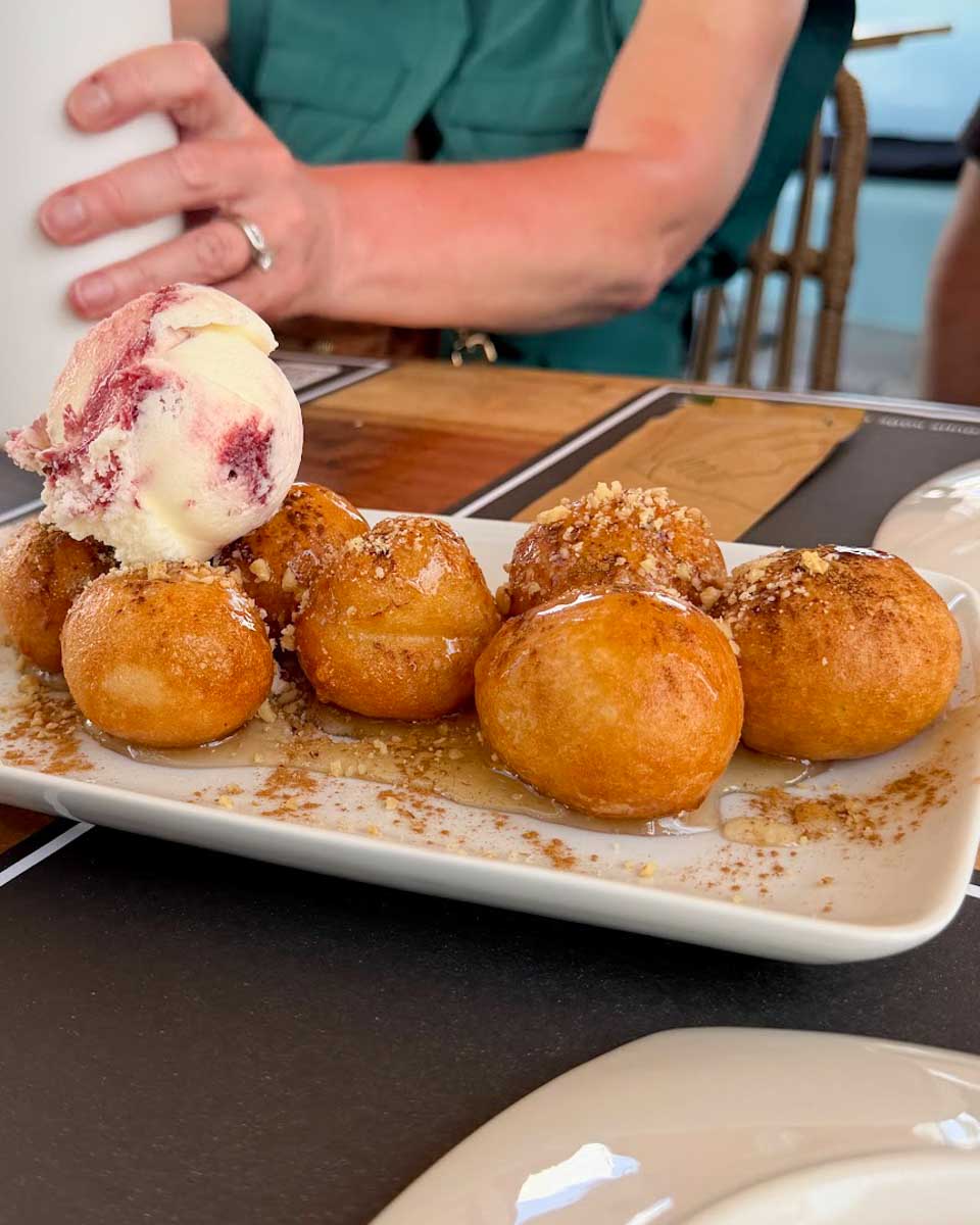 Greek doughnuts eaten on a food tour in Santorini