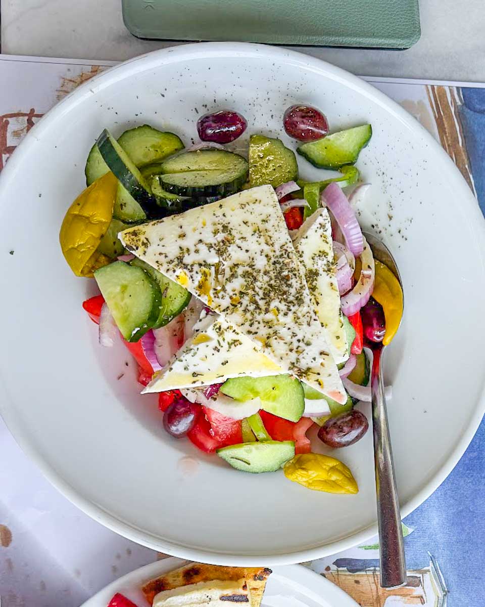 Greek salad made in a cooking class in Santorini