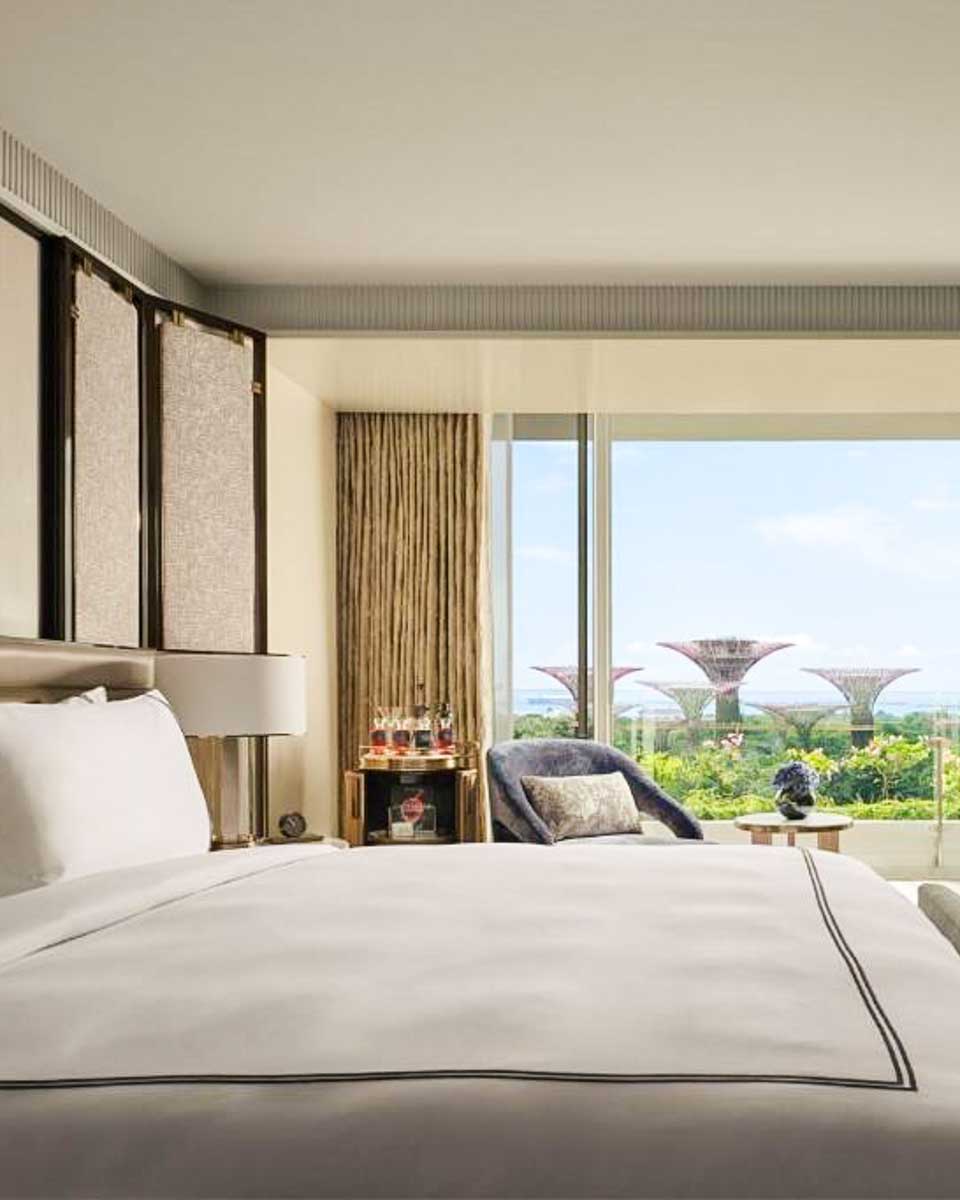 Guest room at Marina Bay Sands Hotel in Singapore with supertree grove view