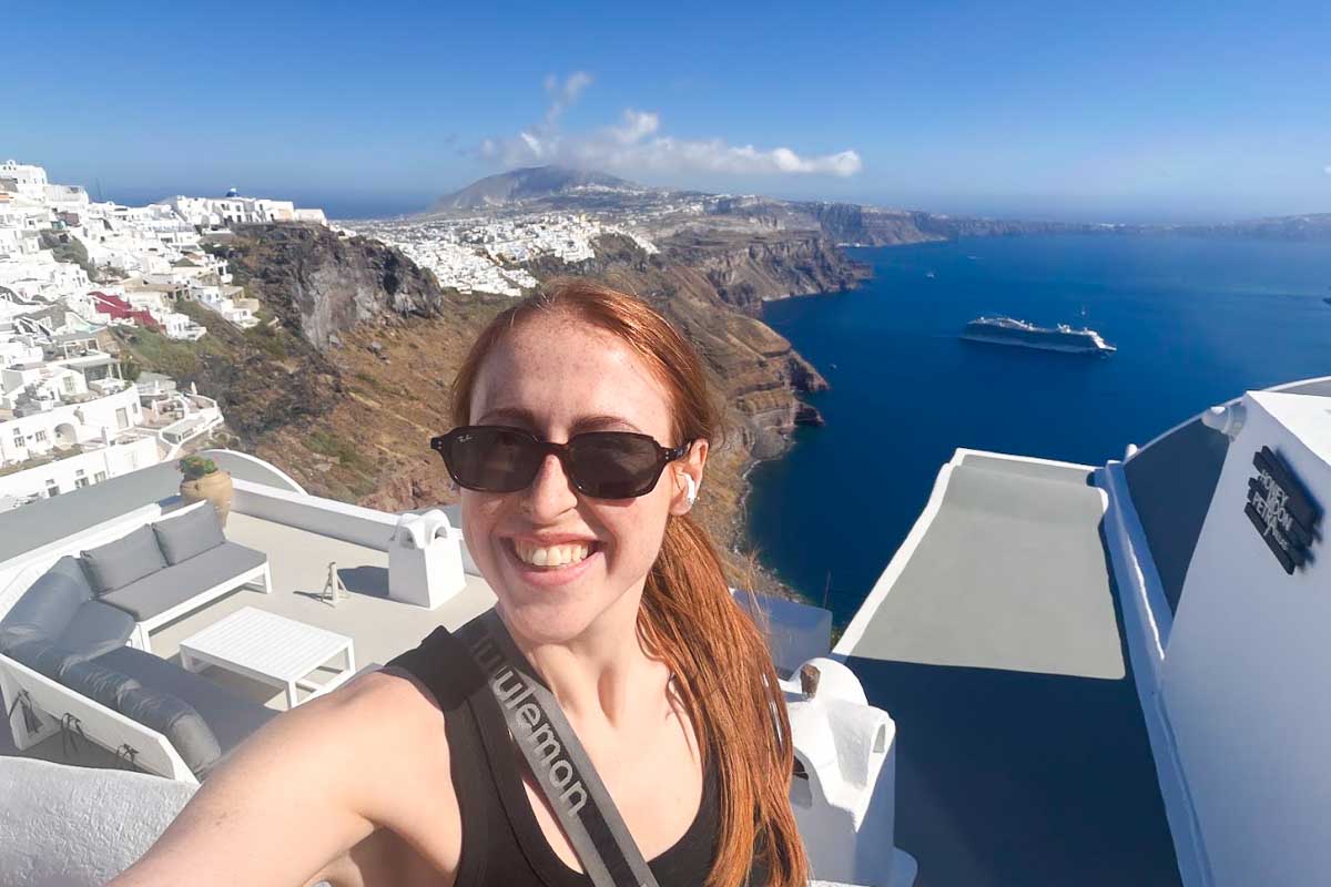 Hannah enjoying the caldera view in Oia, Santorini