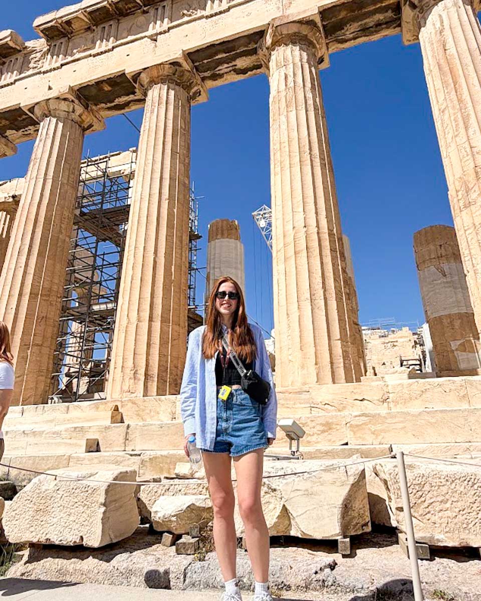 Hannah standing in front of the Parthenon on the Acropolis