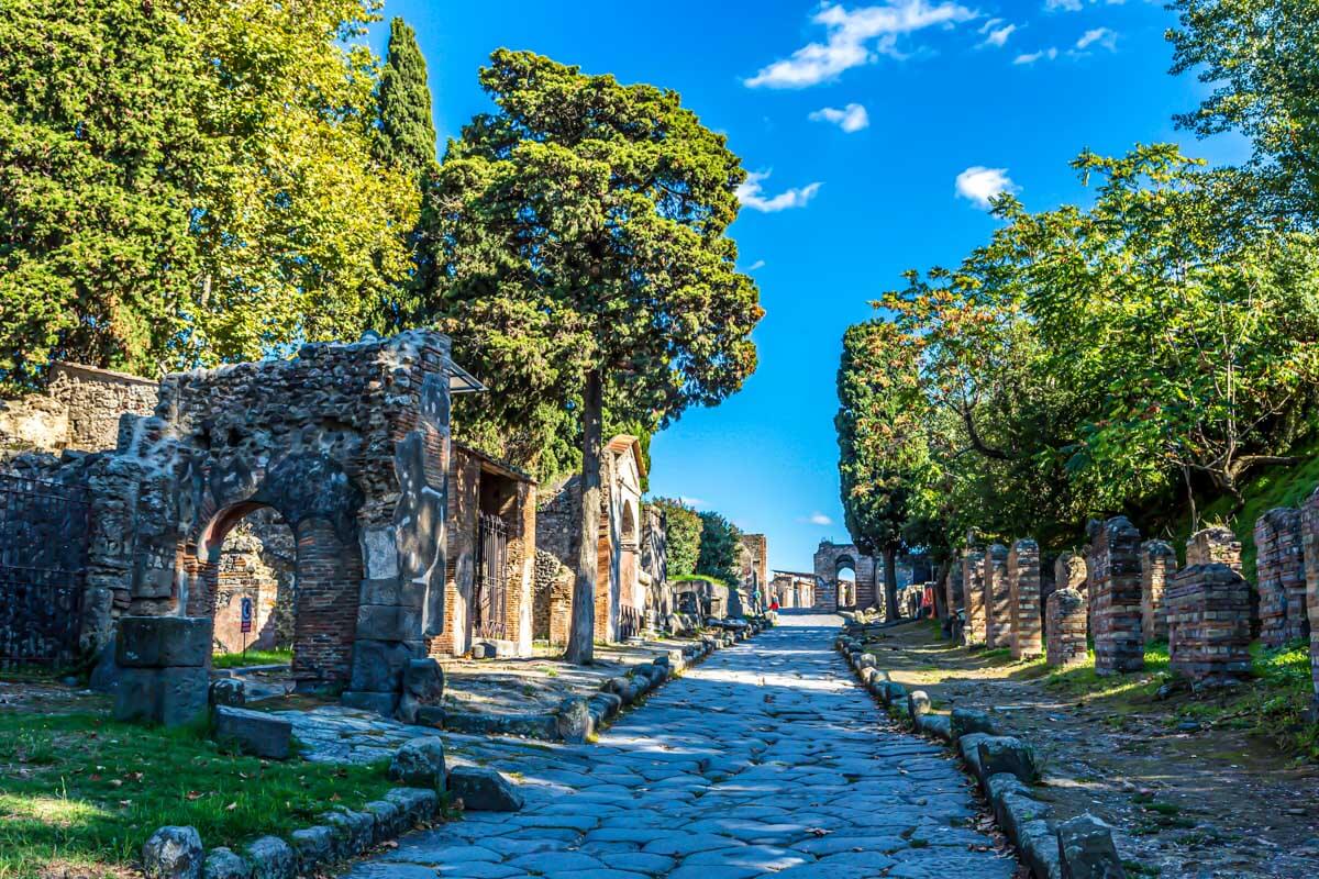 Looking at part of the ruins of Pompeii and trees seen in Pompeii Italy