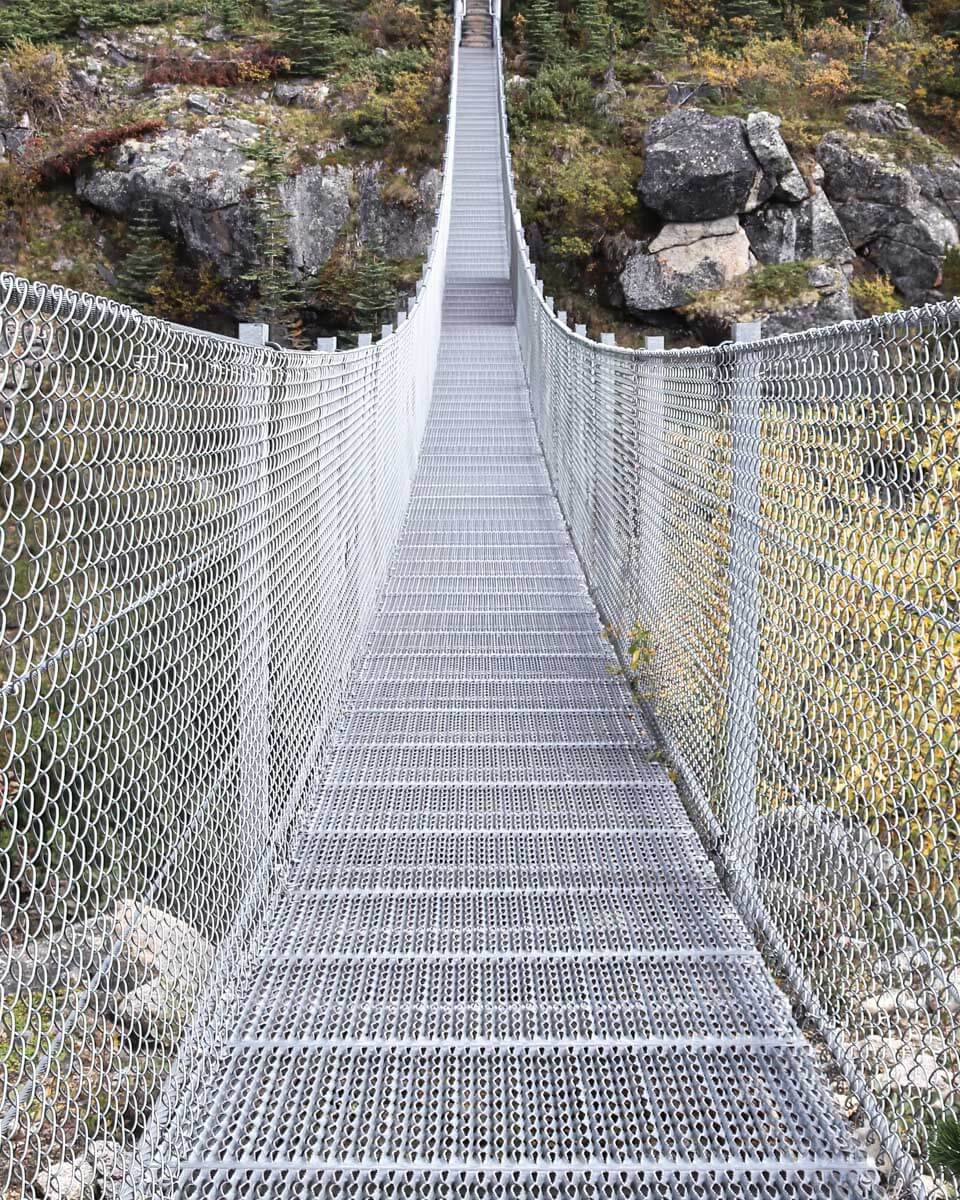Looking at the Yukon Suspension Bridge on a tour from Skagway Alaska