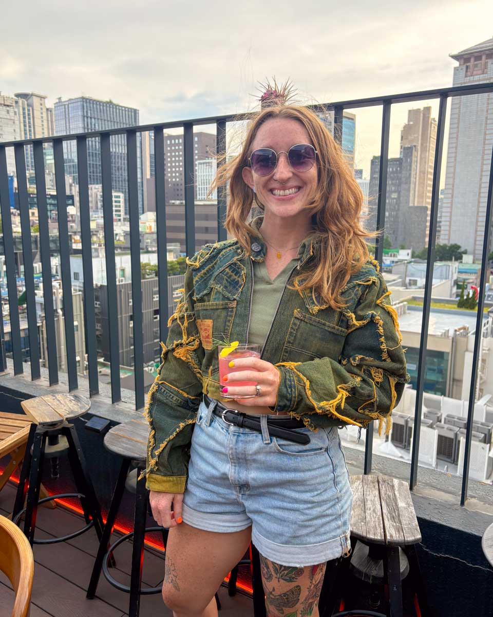 Meghan enjoys a cocktail at The Roof off of Myeong-dong Shopping Street in Seoul South Korea 2