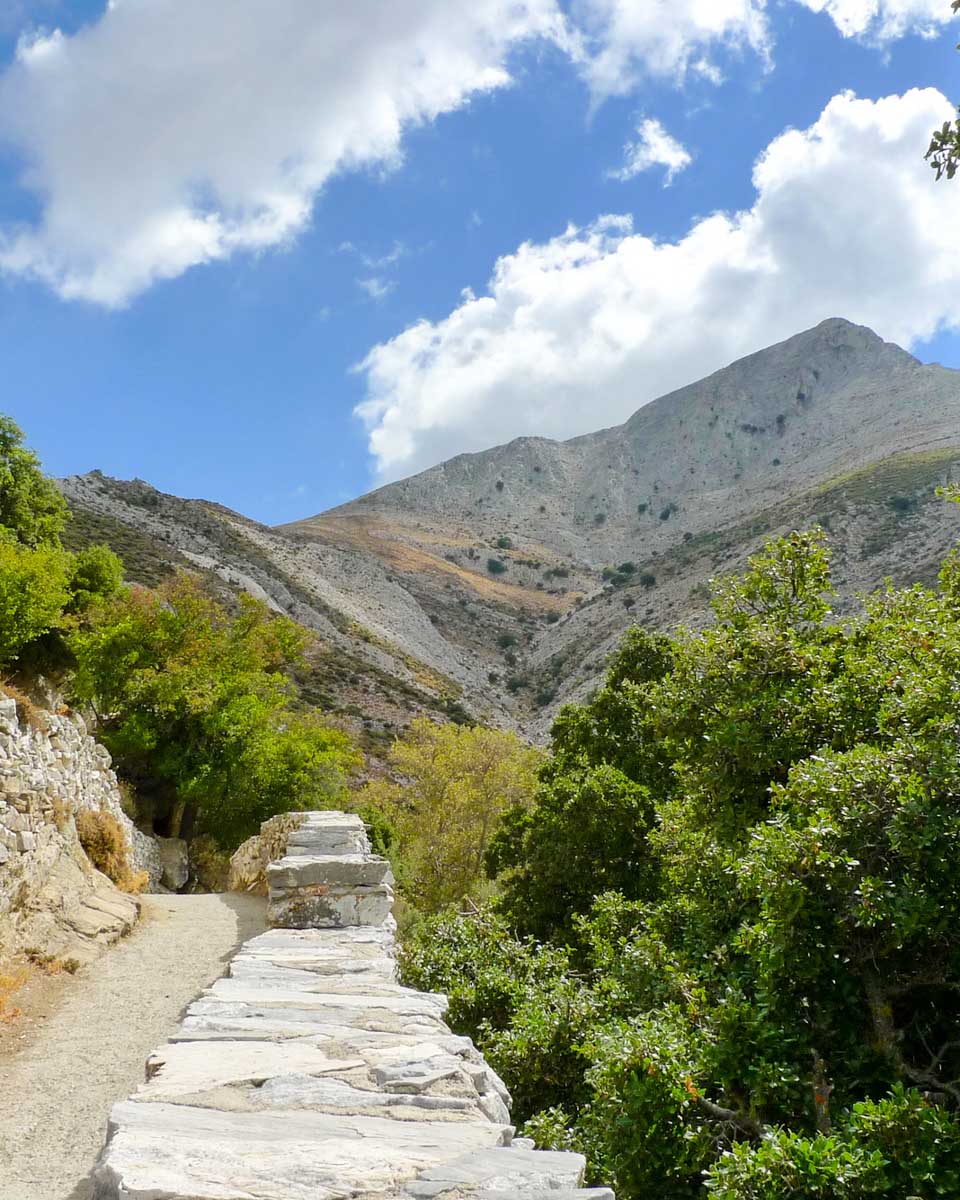 Stone hiking trail leading up Mount Zas in Naxos
