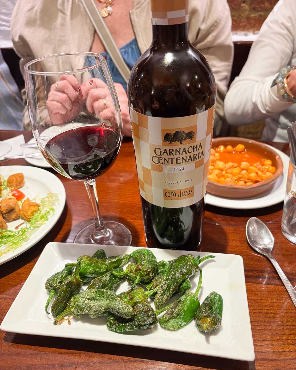 Padrón peppers and wine on a food tour in Madrid