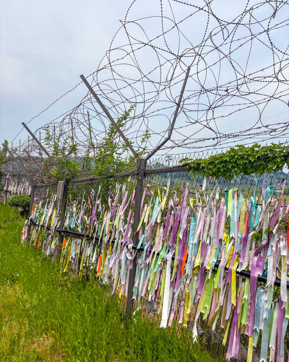 Ribbons on a fence at the DMZ on a tour from Seoul South Korea 3