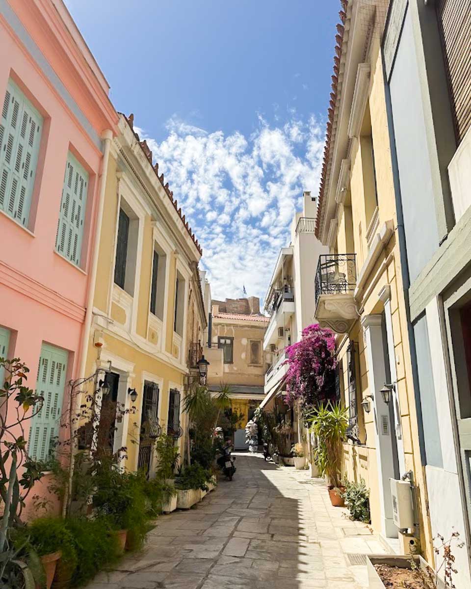 A narrow, colorful street in the Plaka neighborhood of Athens