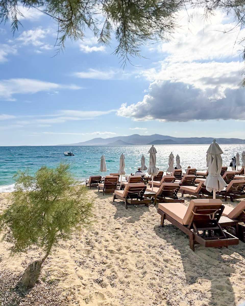 Sunbeds and umbrellas along Agia Anna Beach in Naxos.