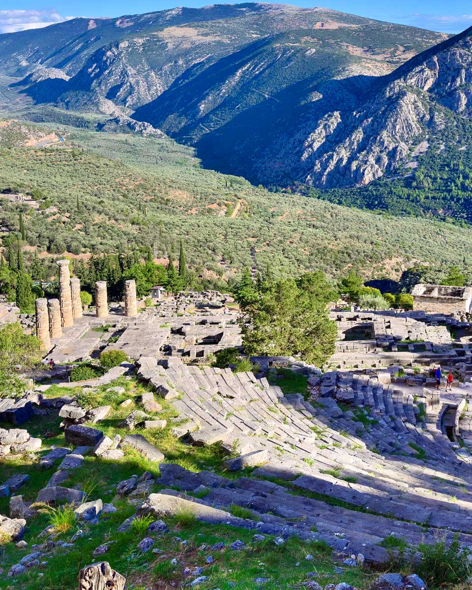 The ancient Theatre of Delphi and the Temple of Apollo in Delphi, Greece