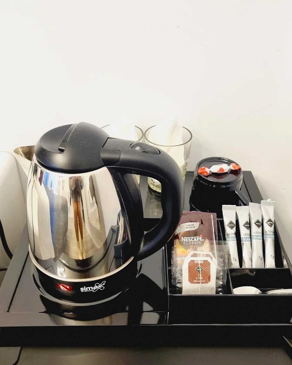 The coffee station in the hotel room at Hostal Lauria in Madrid copy