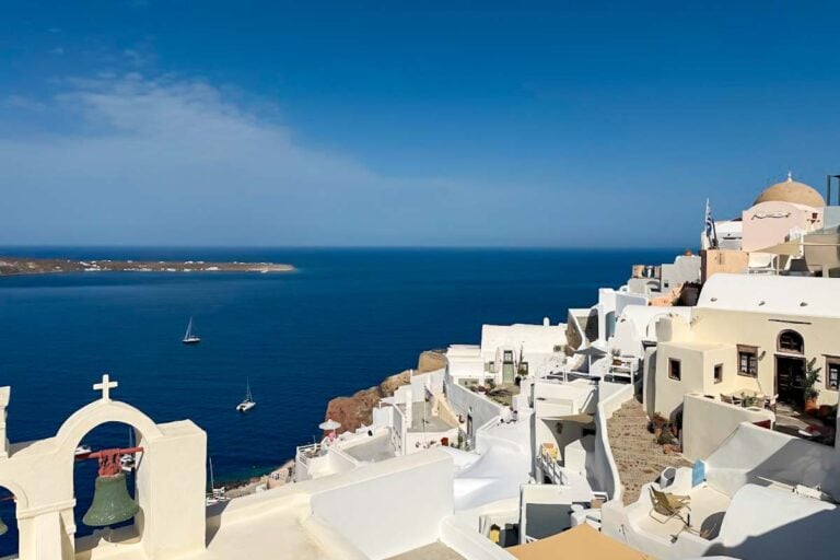 Whitewashed buildings overlooking the Santorini caldera in Oia